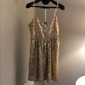 Women’s sparkly gold dress